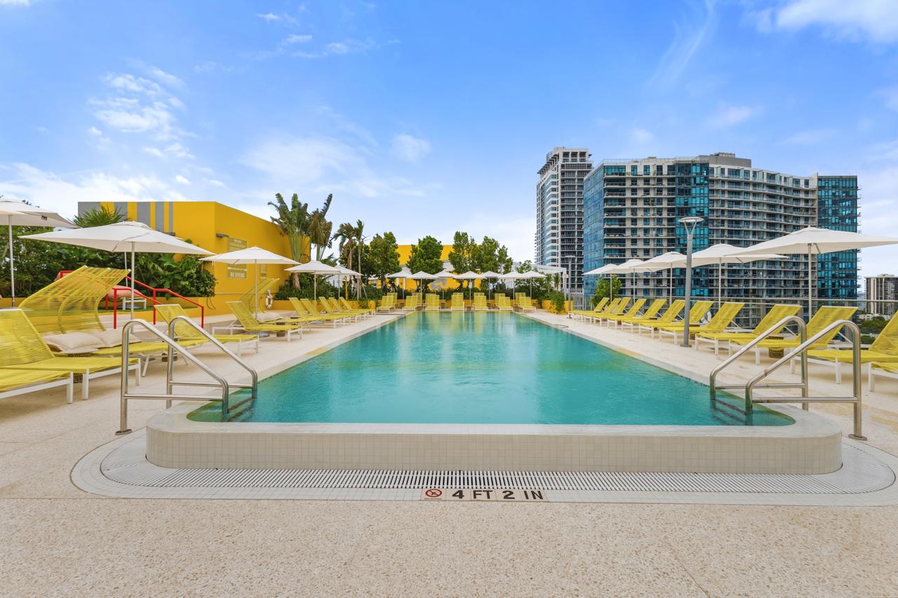 Rooftop resort-style pool with Miami skyline view