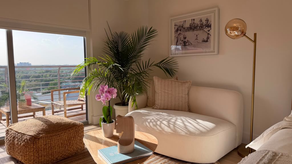 Lounge chair by the window with Midtown Miami view